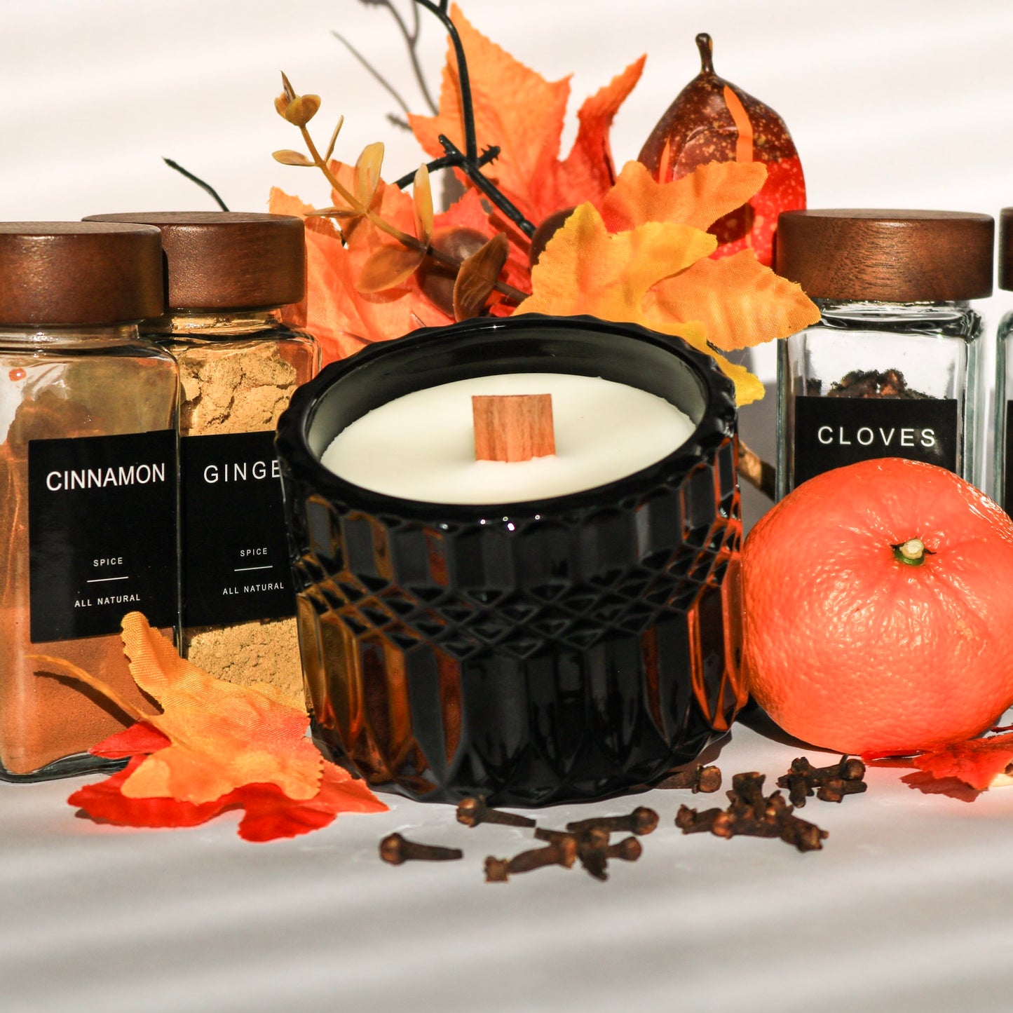 Alt: Step into the past with our 'Grandma's Kitchen Chaos' candle, a gourmand delight of crystalized ginger, cinnamon, clove, nutmeg, and allspice. Experience the chaos of holiday baking without the mess – it's a sweet treat for your nose