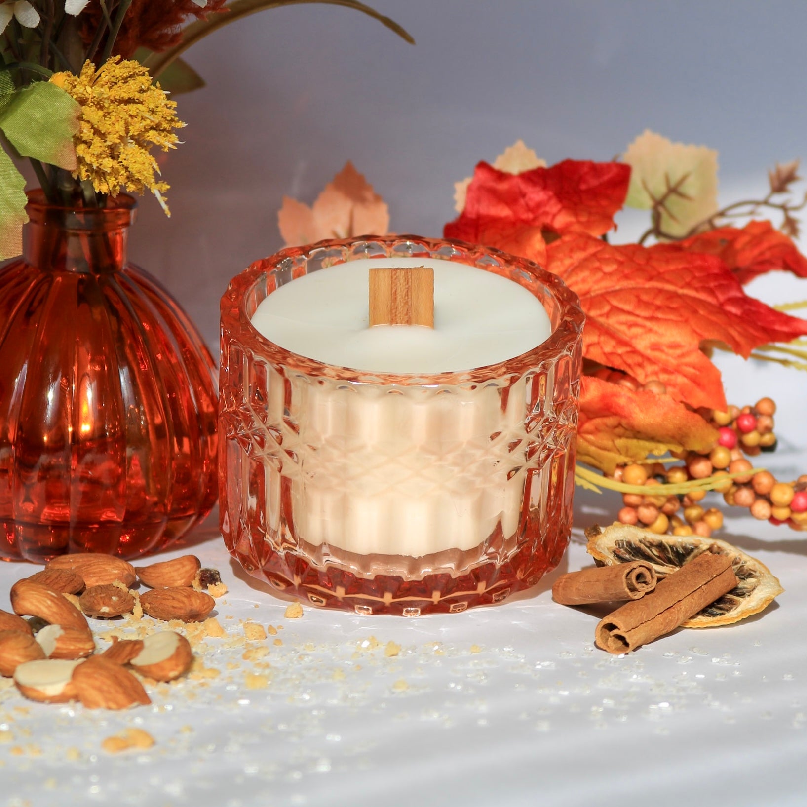 Alt: Say 'ooh la la' to our whimsical 'Almond Macaron Mania' candle, where nutty almonds, creamy amaretto, and a sprinkle of cinnamon, nutmeg, and lemon zest dance in a dessert-scented ballet. Immerse yourself in a guilt-free olfactory feast – because who needs calories when your nose can indulge