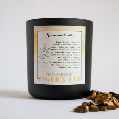 Alt: Texas Bourbon candle—crisp apple, bourbon, maple, cinnamon leaf, adorned with tiger's eye for balance. Immerse in comforting tangerine scents. Illuminate warmth and complexity. 🍏🥃✨